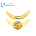 Manufacturer in china custom metal debossed logo enamel wings shaped gold plated airline badges for sale